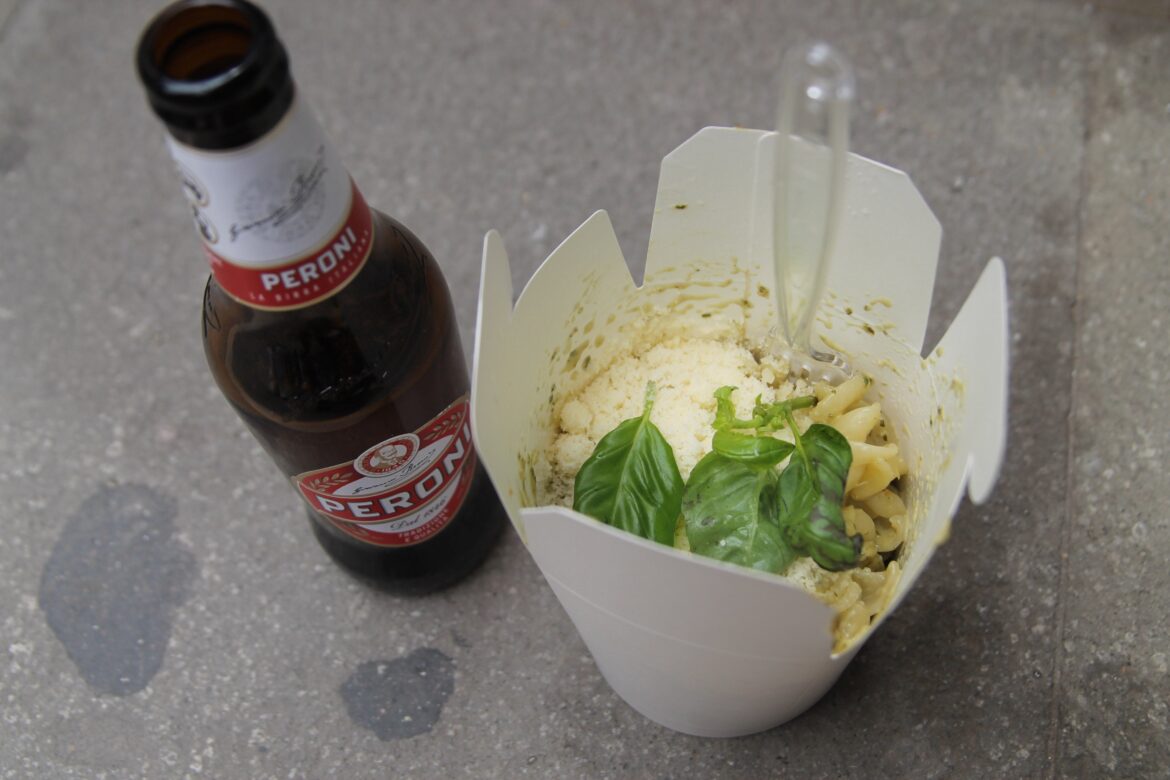 Fresh made pasta with pesto from Alfredo's and a beer in Venice, Italy
