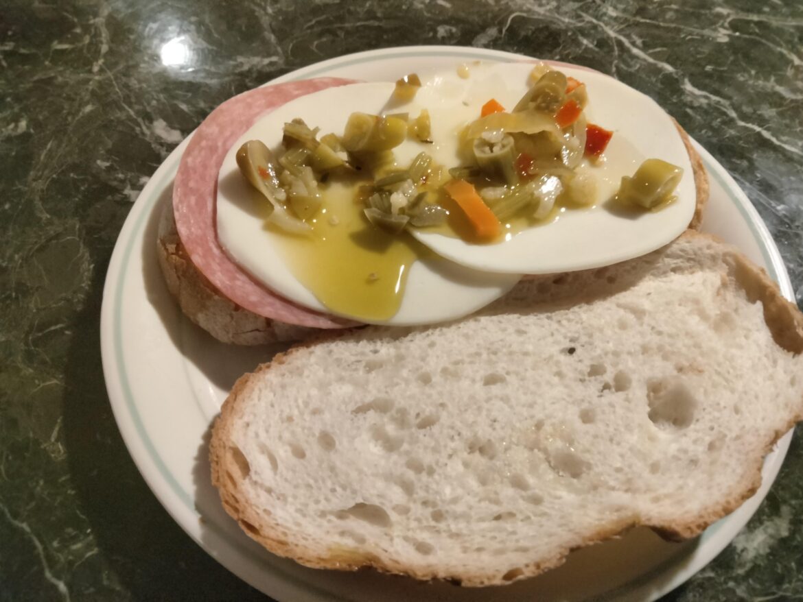 Quick snack of genoa salami, provolone, and hot giardiniera on Turano Italian bread