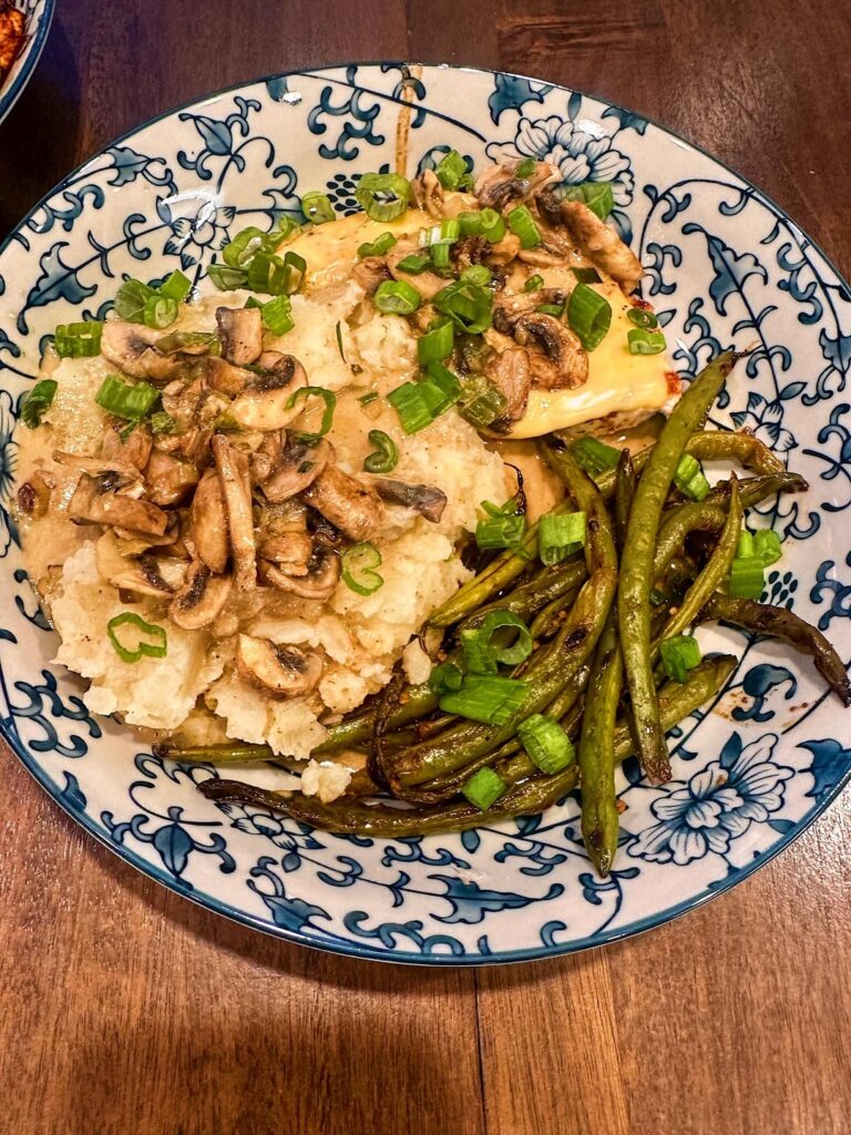 Cheesy Smothered Mushroom Chicken