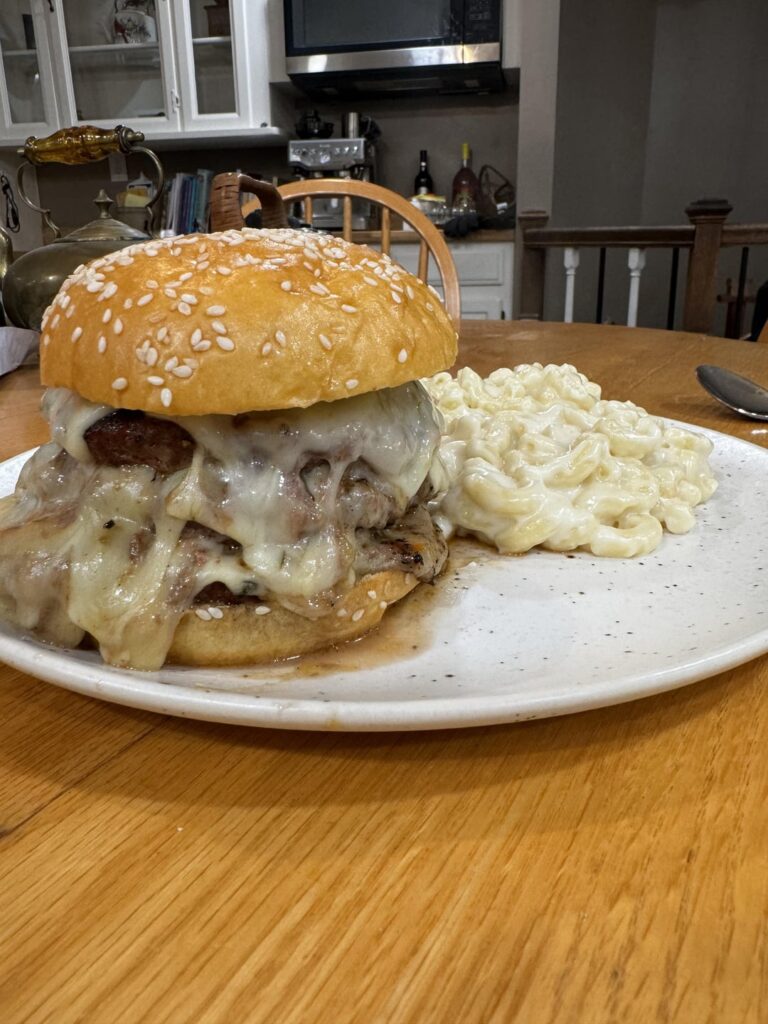 Triple stack cheeseburger with a side of Mac
