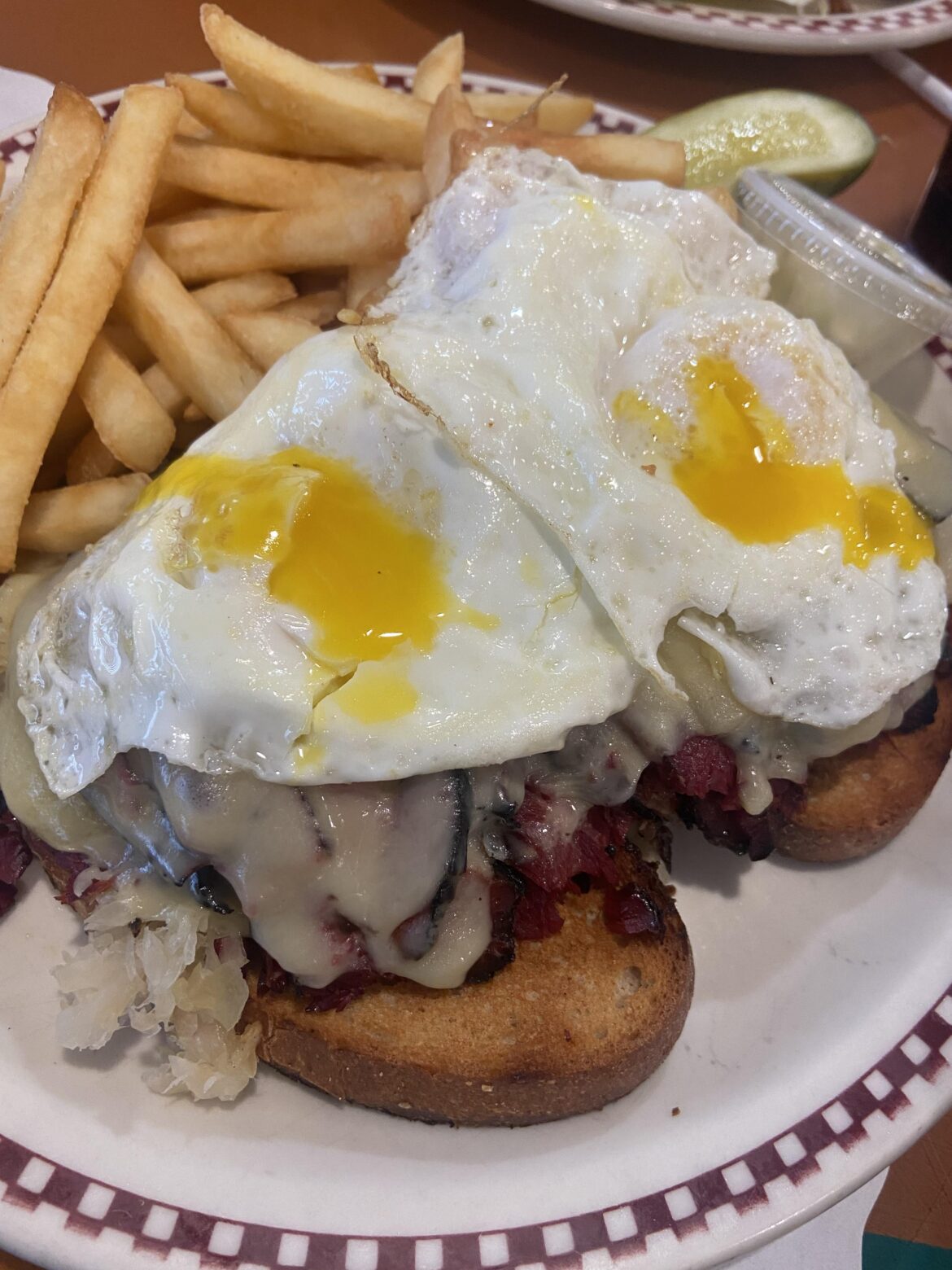 Pastrami Rueben with over easy eggs