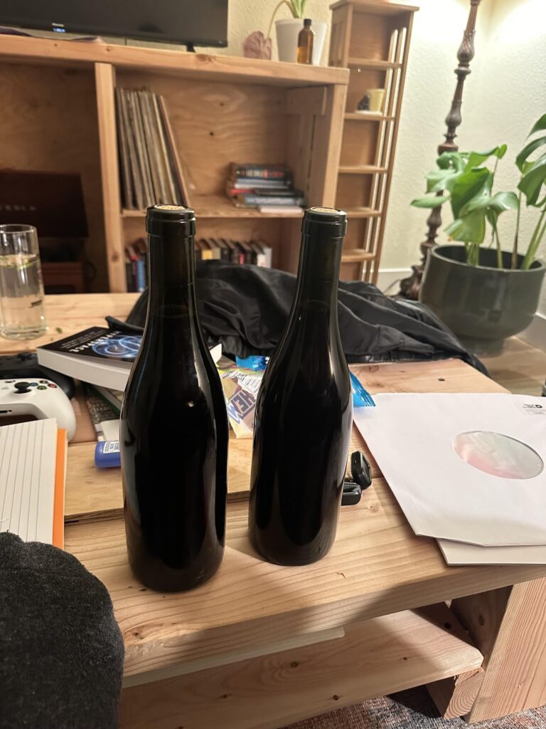 Found these two unlabeled bottles of wine at a gas station on the curb Found these two unlabeled bottles of wine at a gas station on the curb