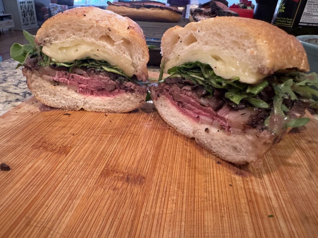 Smoked then seared picanha, havarti, red wine mushroom sauce, and arugula.