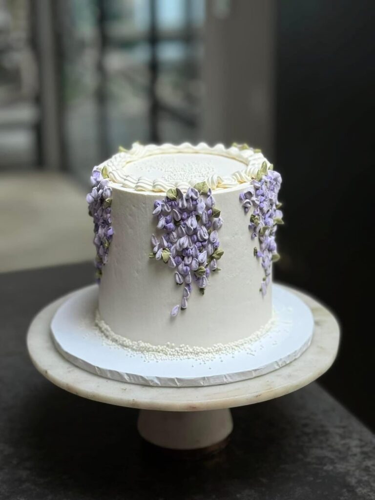 Wisteria cake for my mate’s mum’s 80th. It’s vanilla cake, brushed in yuzu syrup, filled with lemon curd and yuzu jam, and shortbread crumble, and sudachi (like a Japanese lime) buttercream.