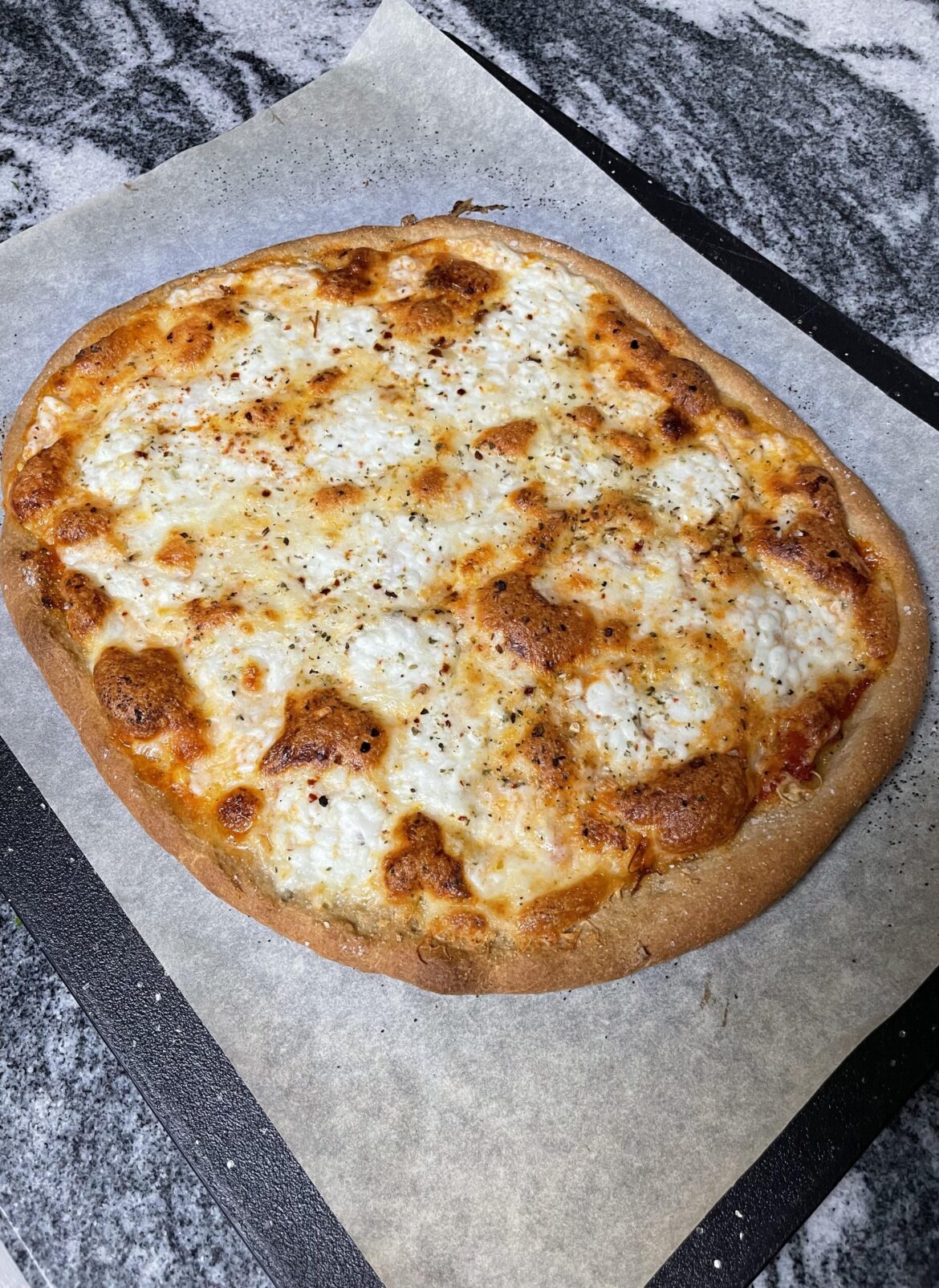 Cheesy Protein Pizza - One Serving (4 slices) 550 kcal, 55 g protein