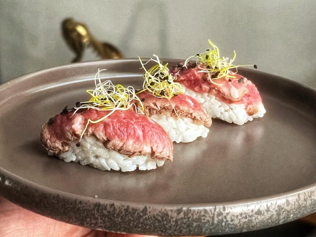 Shaoxing marinated flank steak, flash sear - rice - green radish sprouts - lava salt