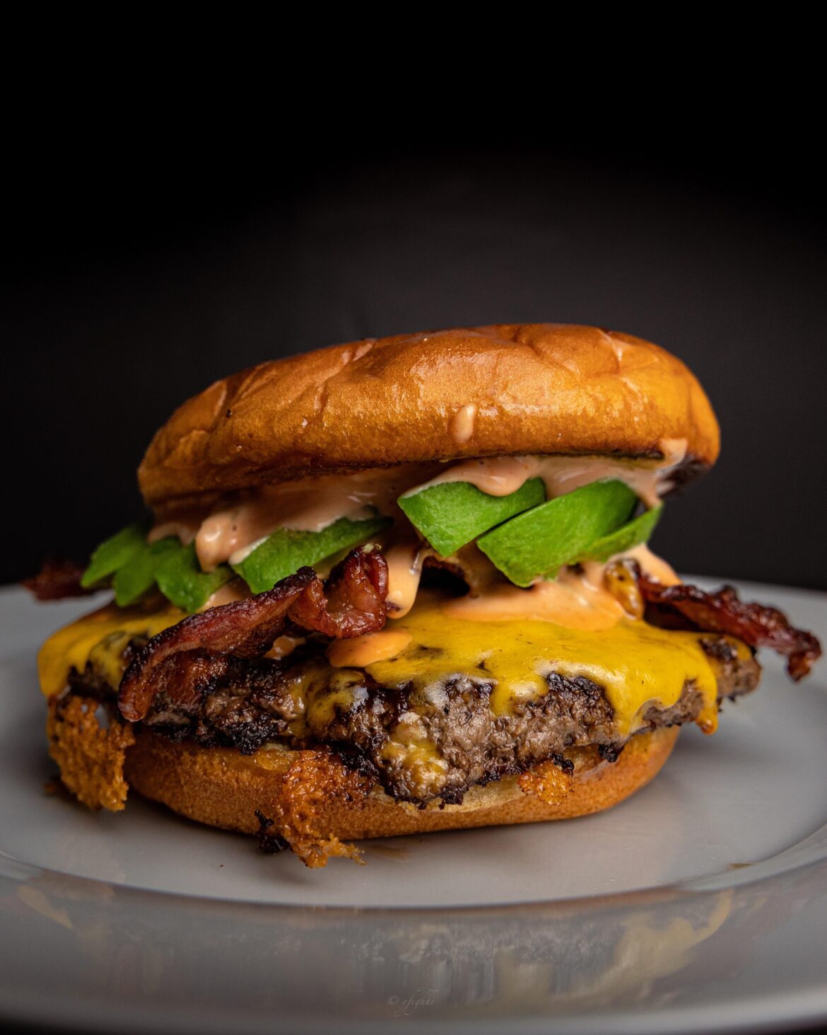 Bacon avocado cheddar cheese burger