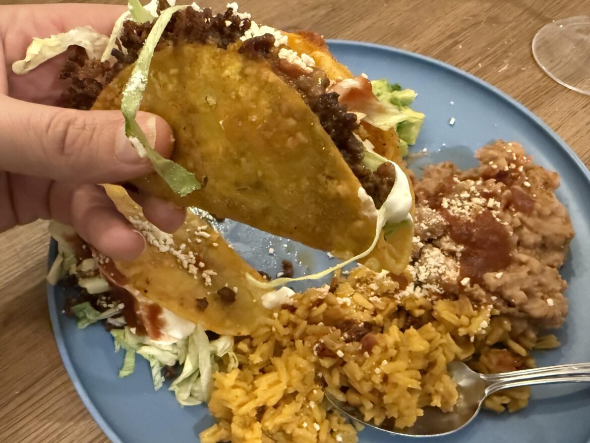 Ground beef tacos with crispy corn tortillas.