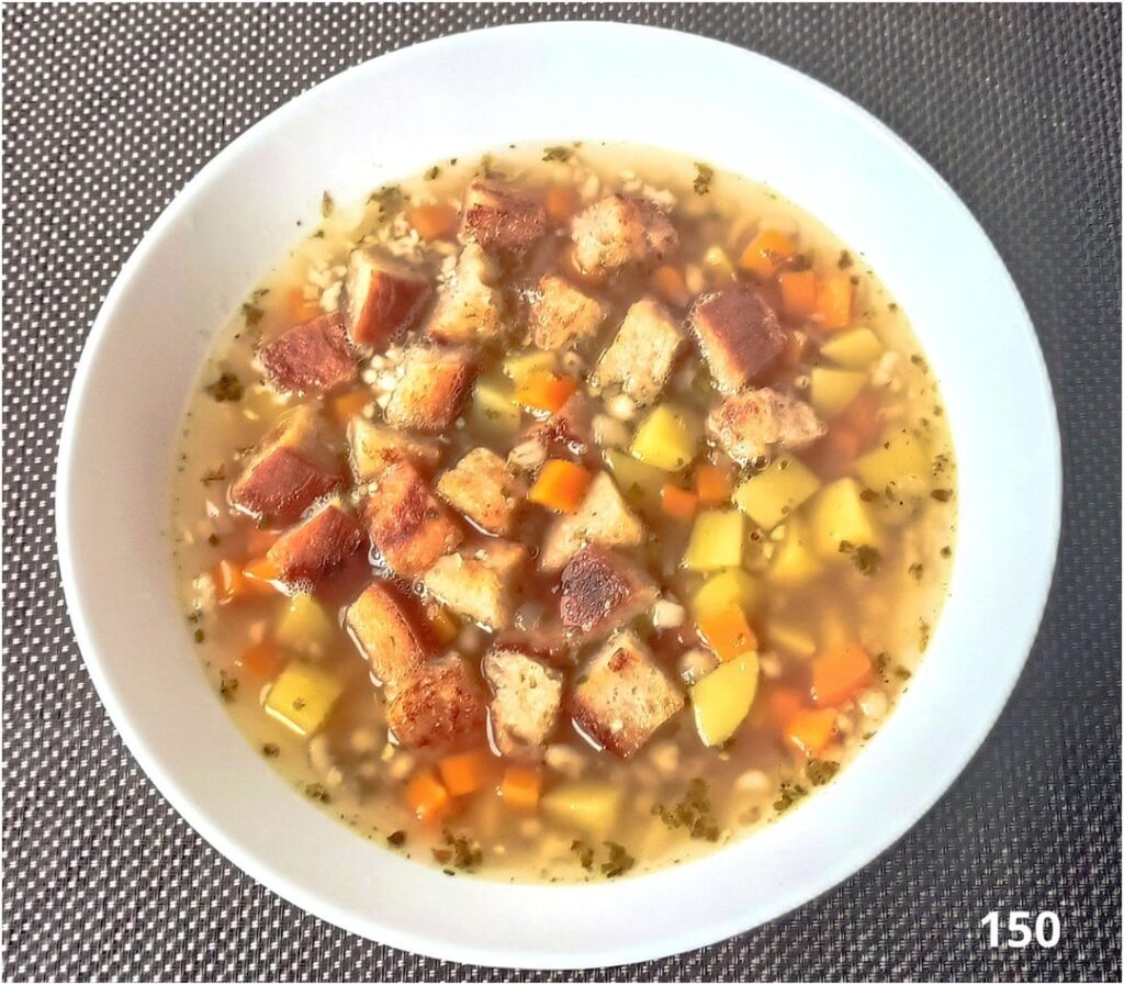 Garlic soup with toasted bread, pork leg with parsley sauce with honey and egg barley "tarhonya"