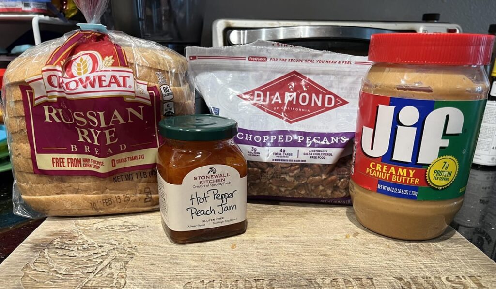 PBJ on seeded rye with jalapeño peach jam and pecans.