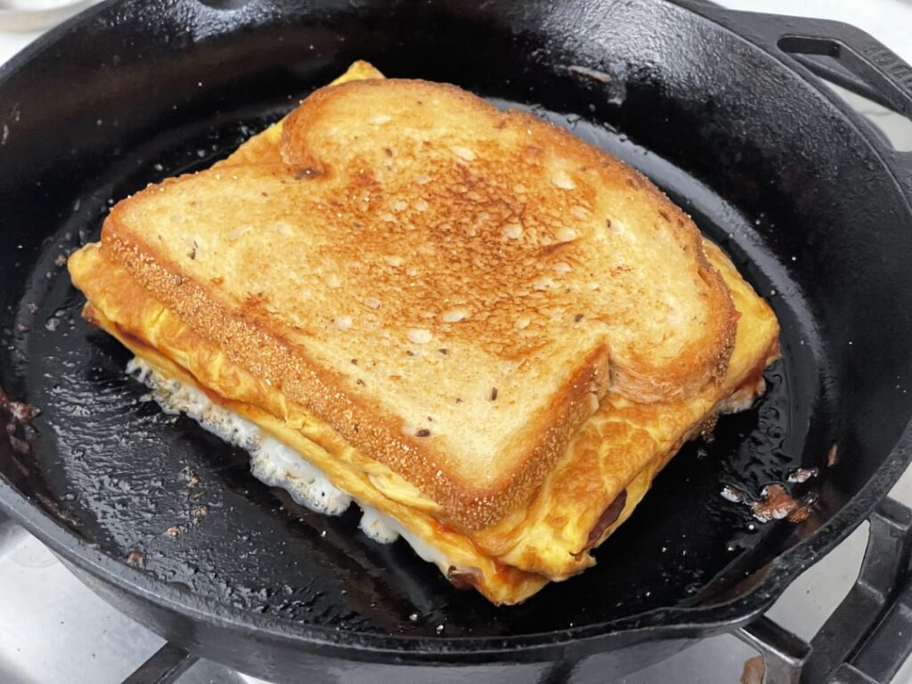 Egg and spam, queso Oaxaca, mayonnaise and ketchup, melted on California rye —