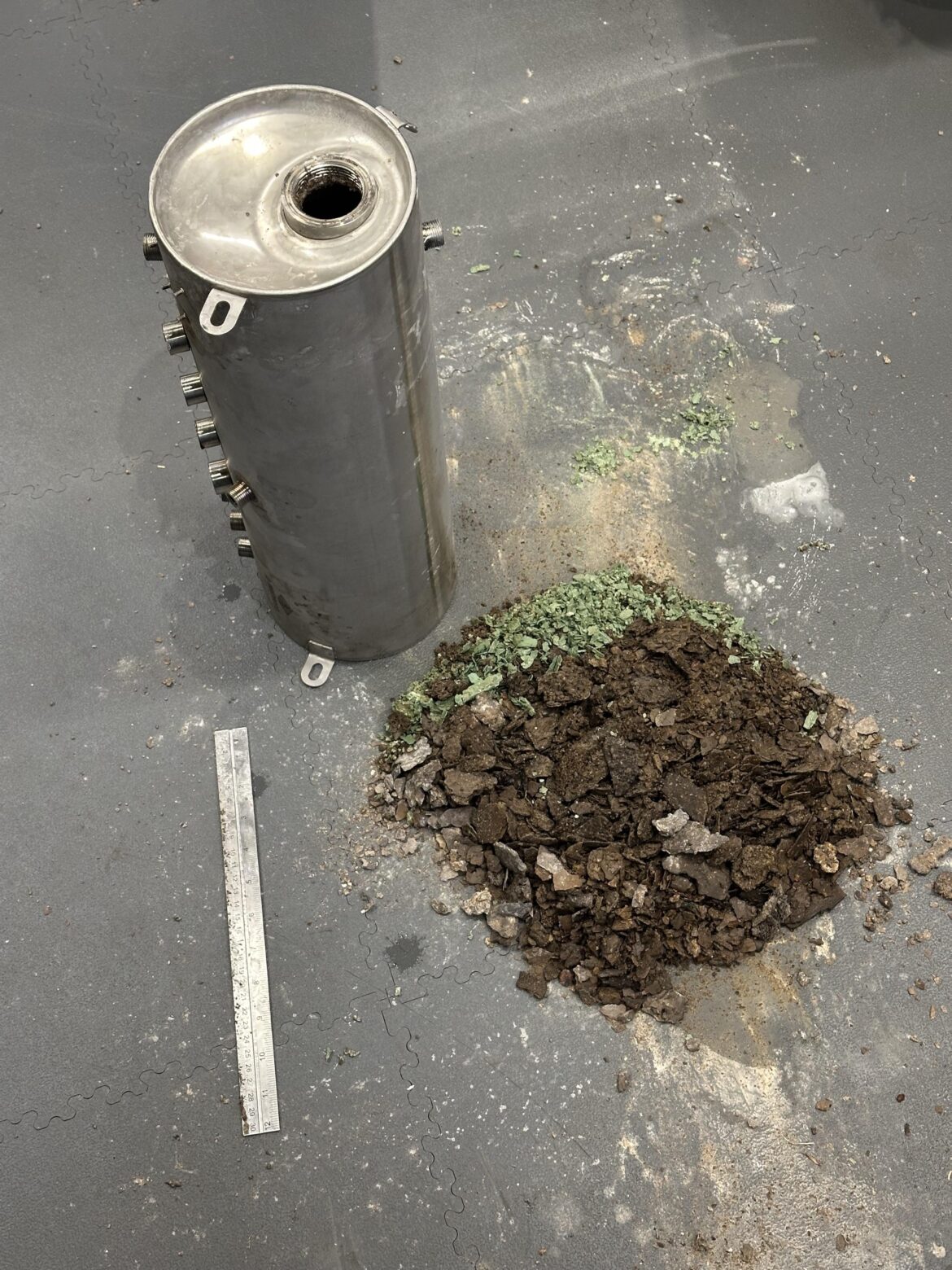 Change your water filter regularly folks! (This is what I could get out by hand, there’s still some big rocks in there!)