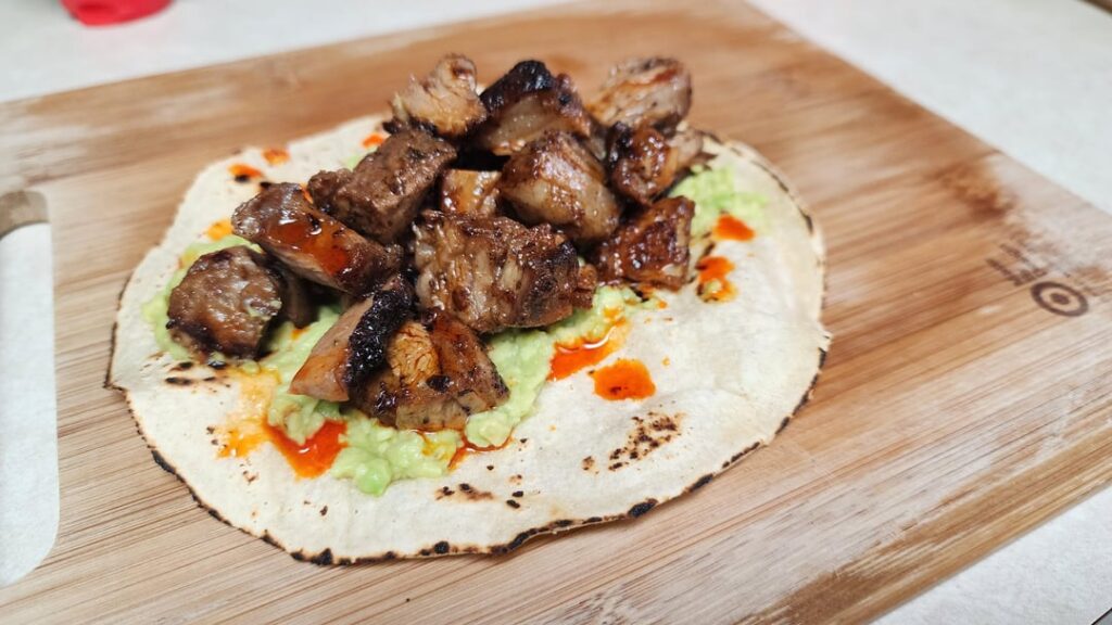 Homemade Cabrito Tacos con Salsa Verde Guacamole y Chipotle Salsa Macha Homemade Cabrito Tacos con Salsa Verde Guacamole y Chipotle Salsa Macha