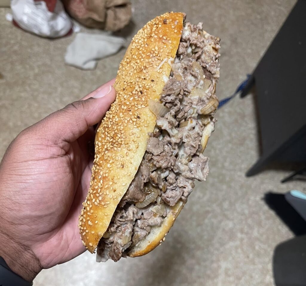 Homemade cheesesteak on homemade hoagie roll. Recipe in description