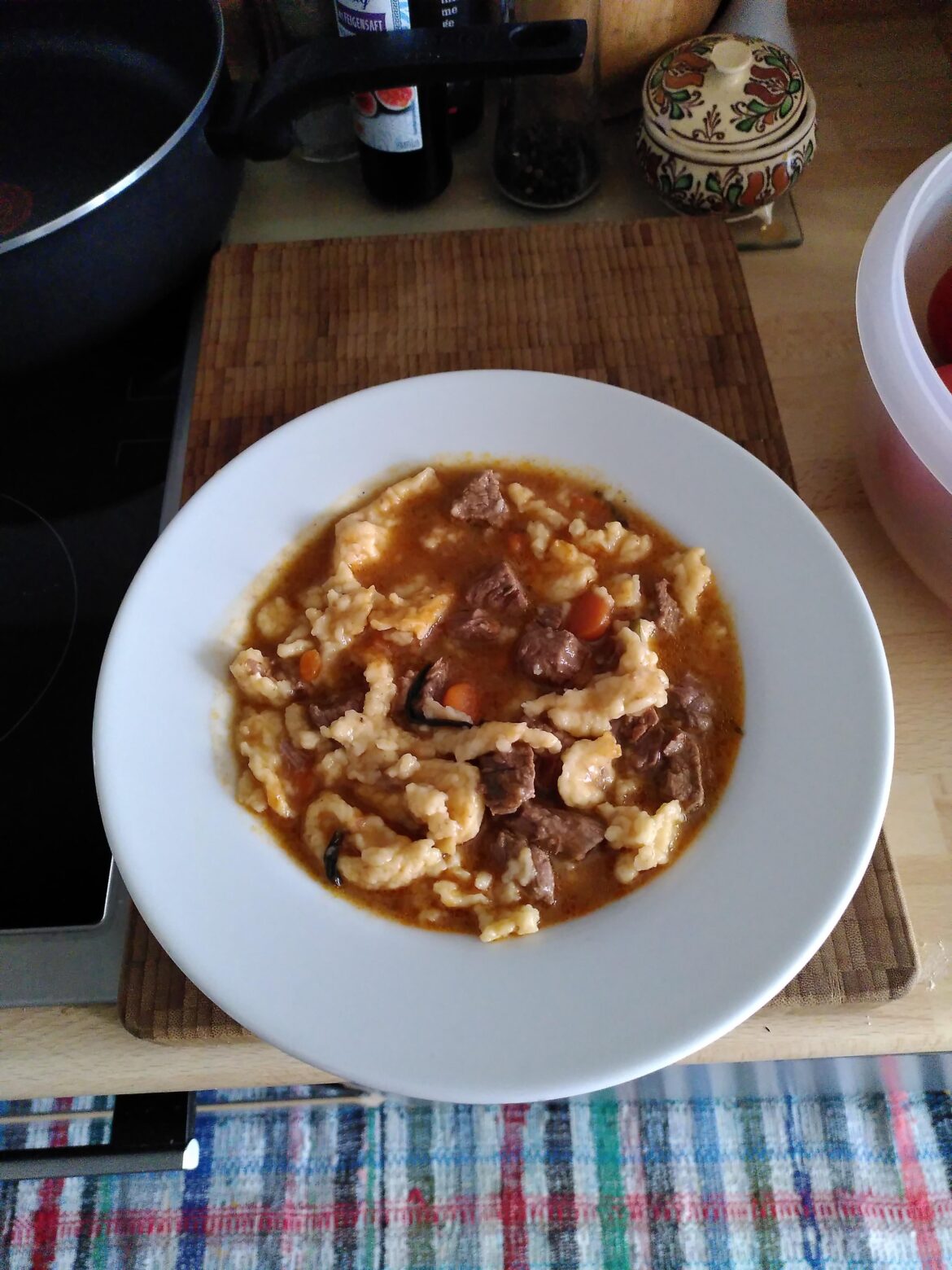 Transylvanian Hungarian style goulash (beef) soup with galuska (dumplings) and pickled estragon