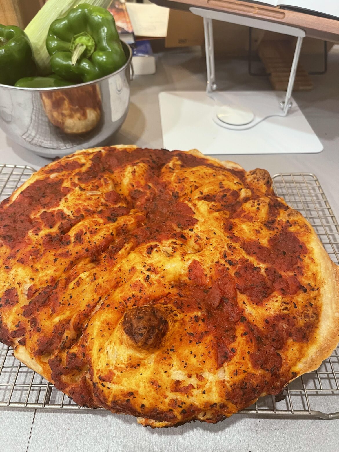 Made my first bread on the BGE!  I made a focaccia with a basic marinara on top!  It tastes wonderful, but it took a little longer to cook because of all the moisture brought the temperature down. I’d make it again.