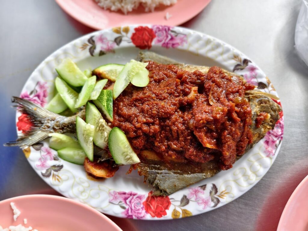 Fried pomfret with sambal in Malaysia