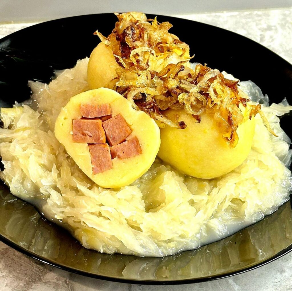 Potato dumplings stuffed with sausage, sauerkraut, fried onions or potato gnocchi with green onions. Dessert - snow "Pavlov" with whipped cream and mascarpone and fruit.