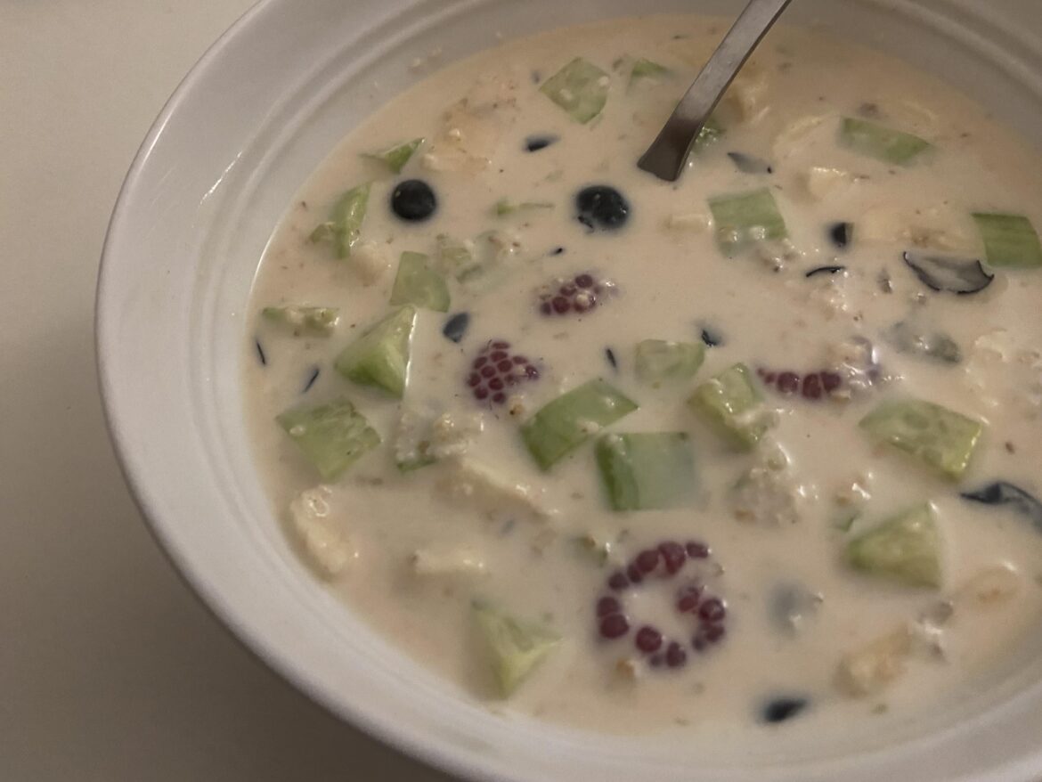 Tried cucumbers with oats for the first time, was very refreshing [also including banana, raspberries, blue berries, peanut butter, sugar, Greek yogurt & milk]