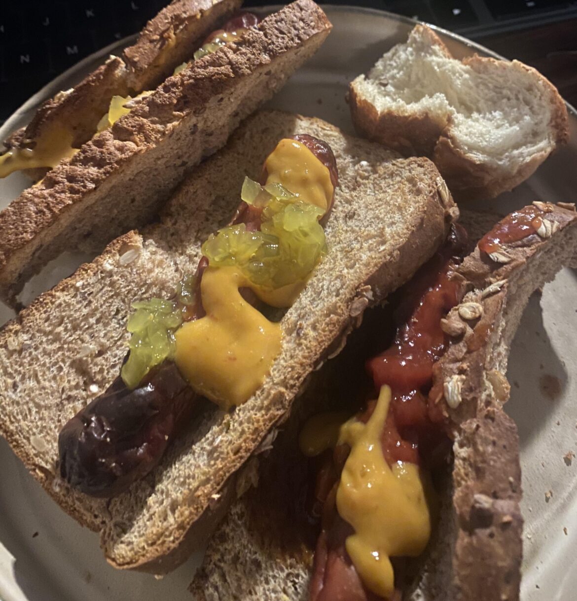 Low on groceries and won’t be able to buy more for at least 3 weeks. I present to you… ghetto hotdogs, complete with a variety of sauces from various fast food chains 🙏🤙🏽