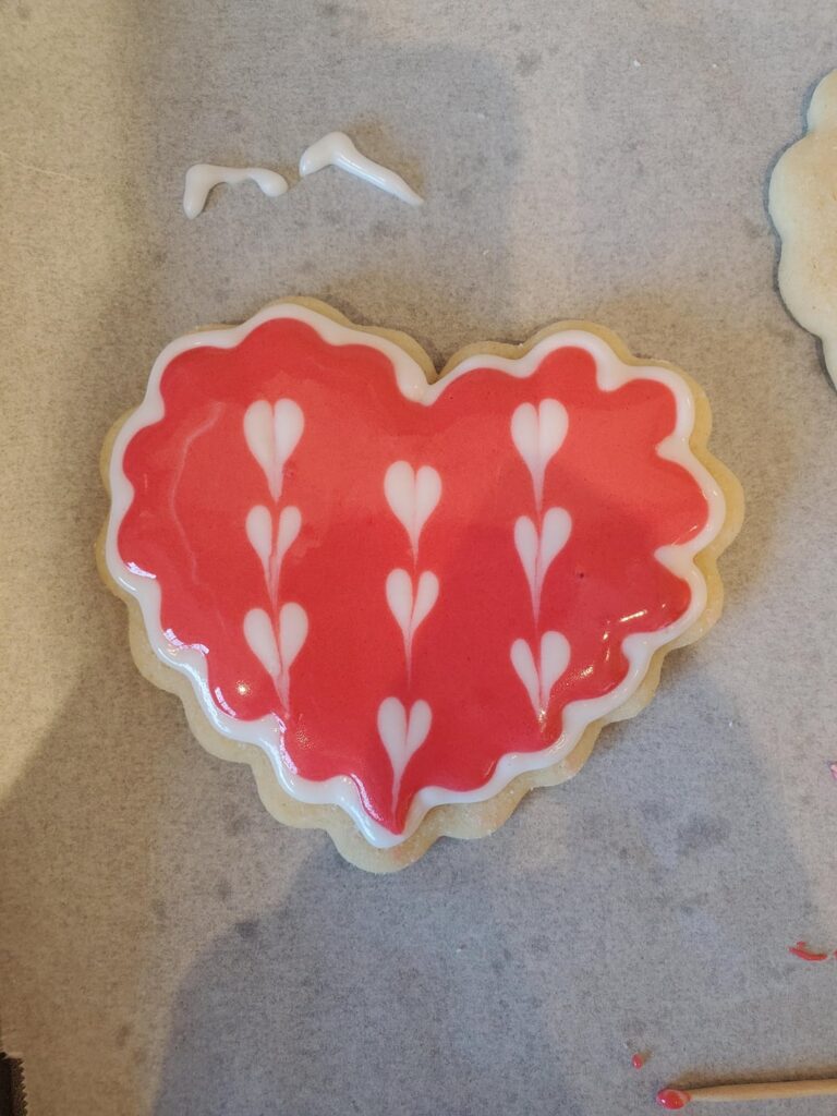 Not very fancy, my first time using royal icing. Good practice. :)