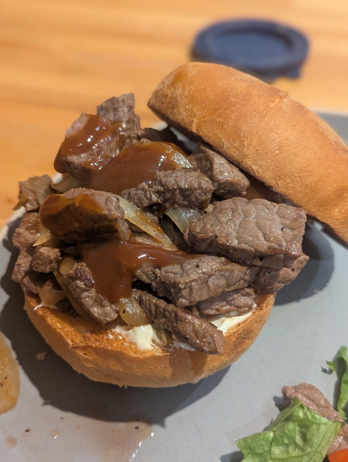 Made this'n last week. Steak and onion on fresh bakery roll with horseradish mayo and HP sauce.