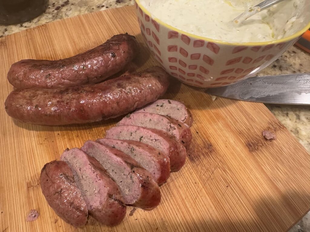 Made rosemary and red wine lamb sausage