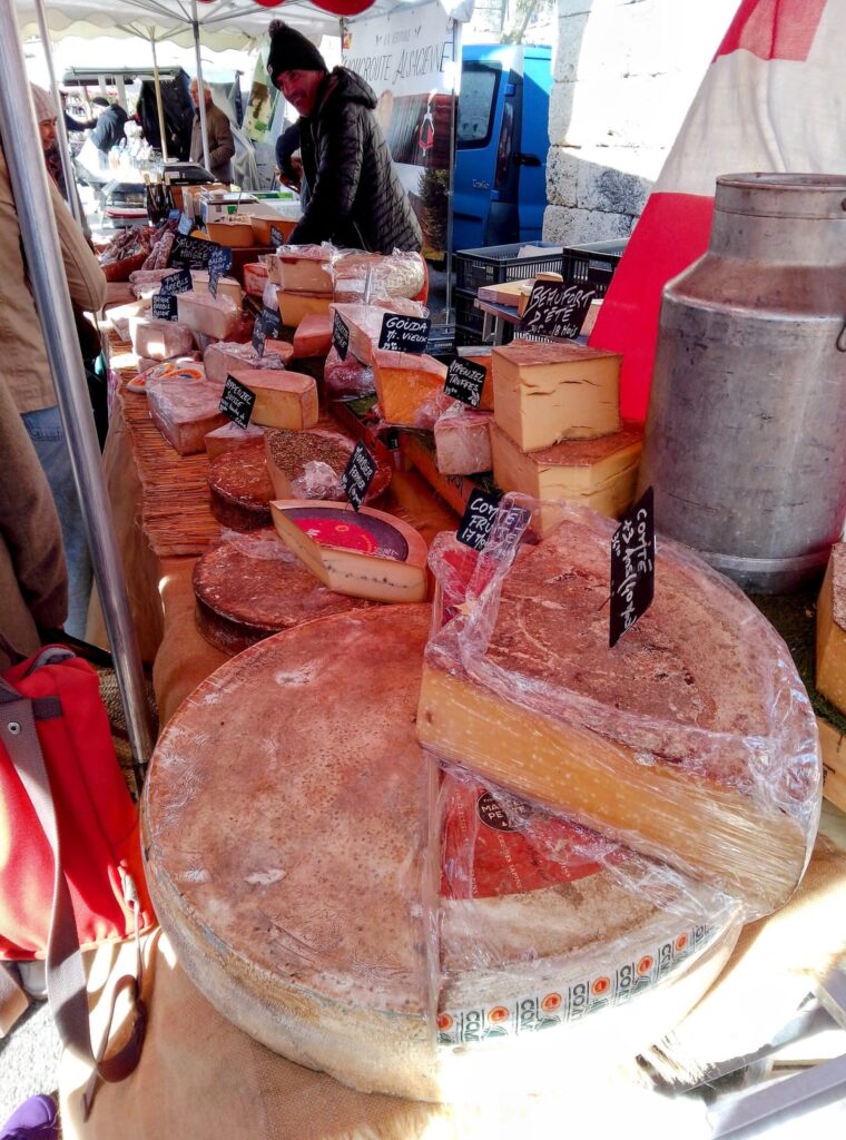 Queuing up for some cheeses in my local food market in France