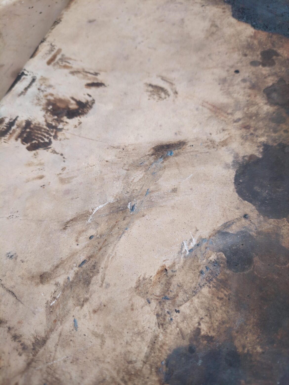 Melted plastic on deflector stone