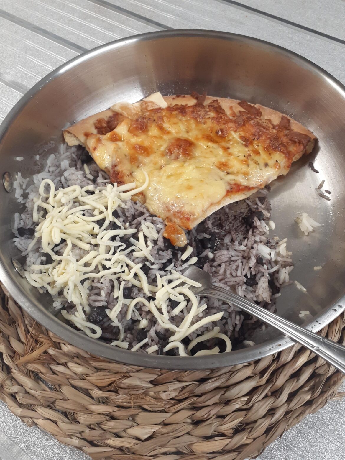 Rice, black beans, grated cheese and pizza. "I ask you all: is that right?"