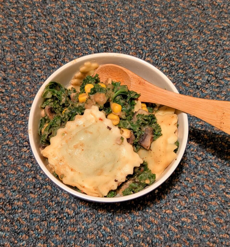 Ravioli and veg in butter bean sauce