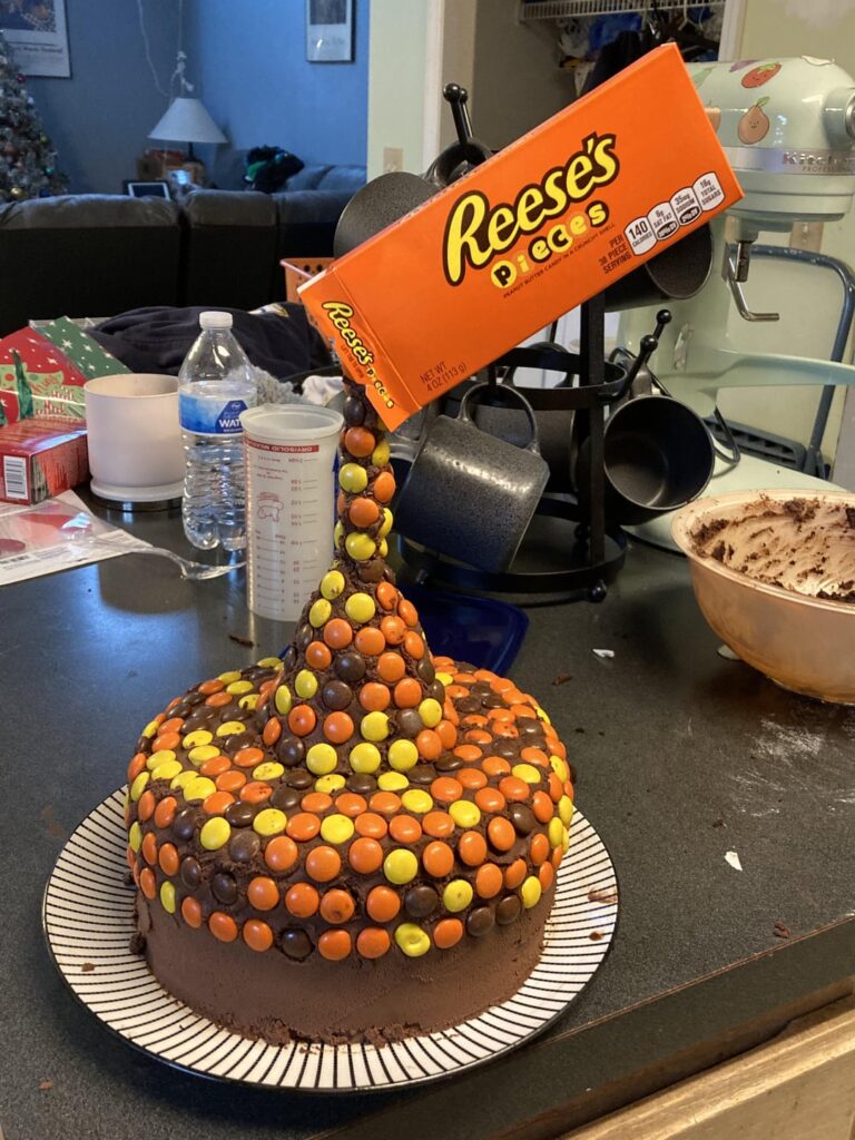 It ain’t perfect, but I sure am proud.  Gravity defying Reeces Pieces cake for my best friend’s birthday