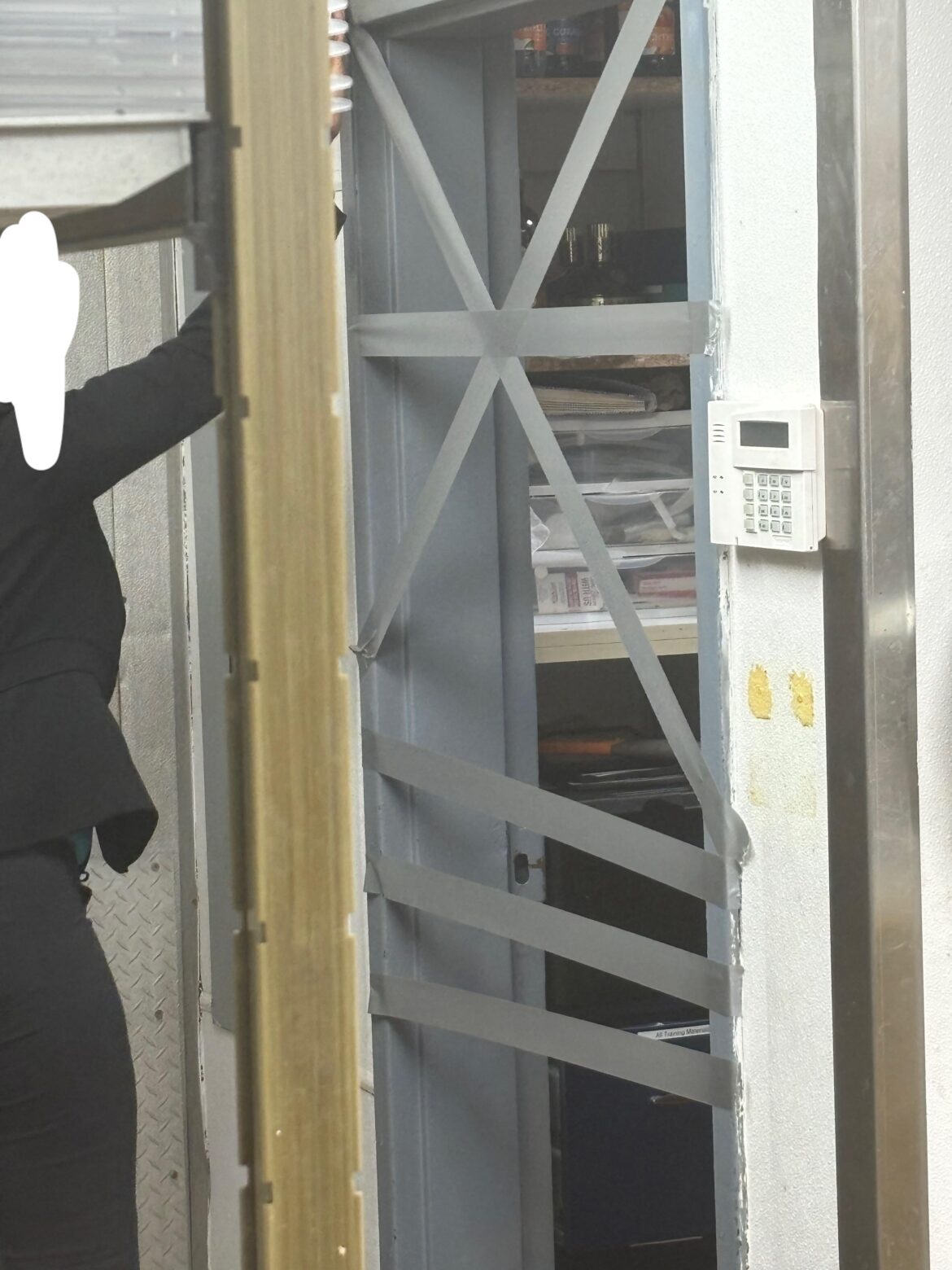 Owner trapped in office during rush