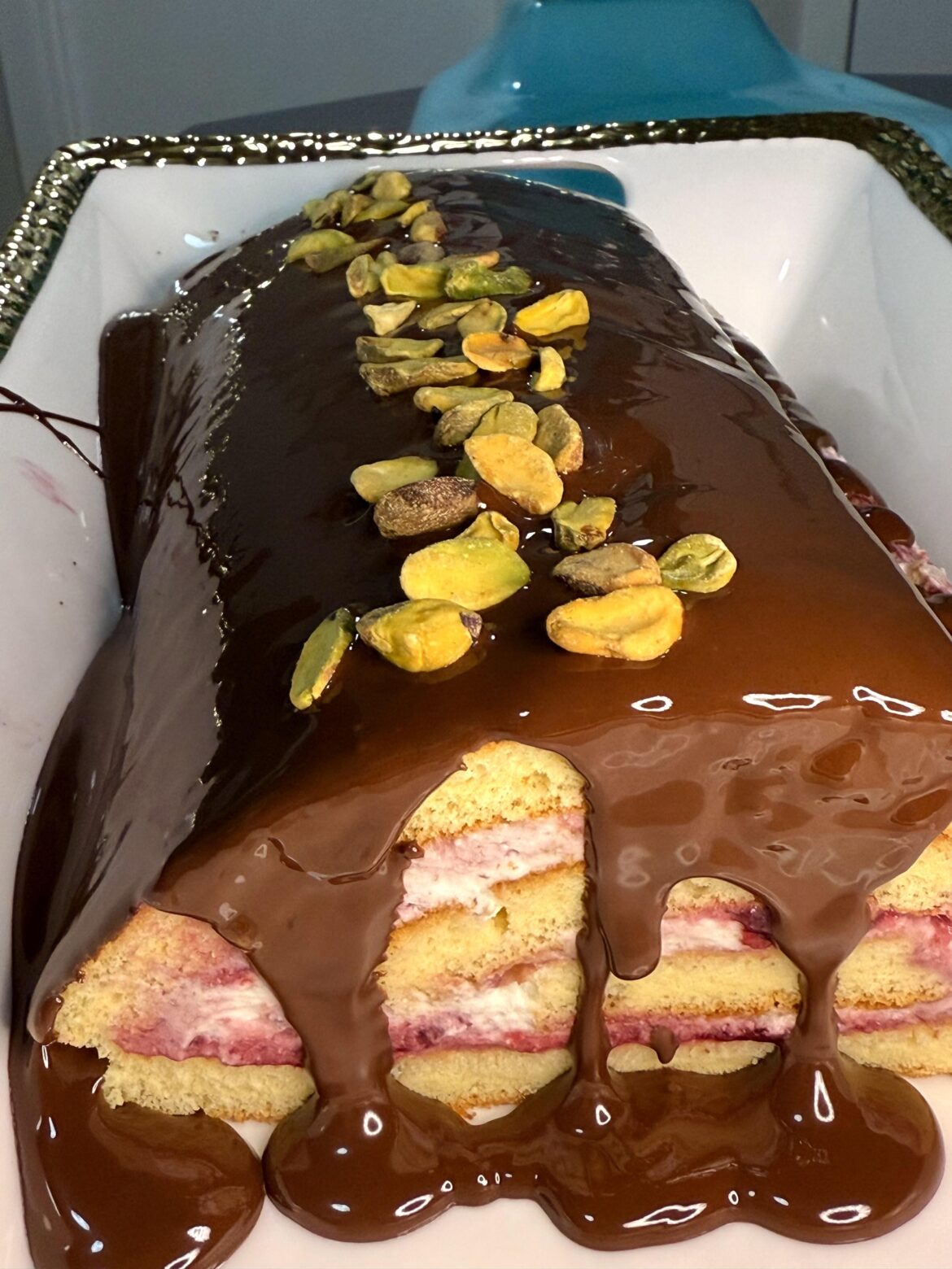 Dark cherry and pistachio Swiss roll