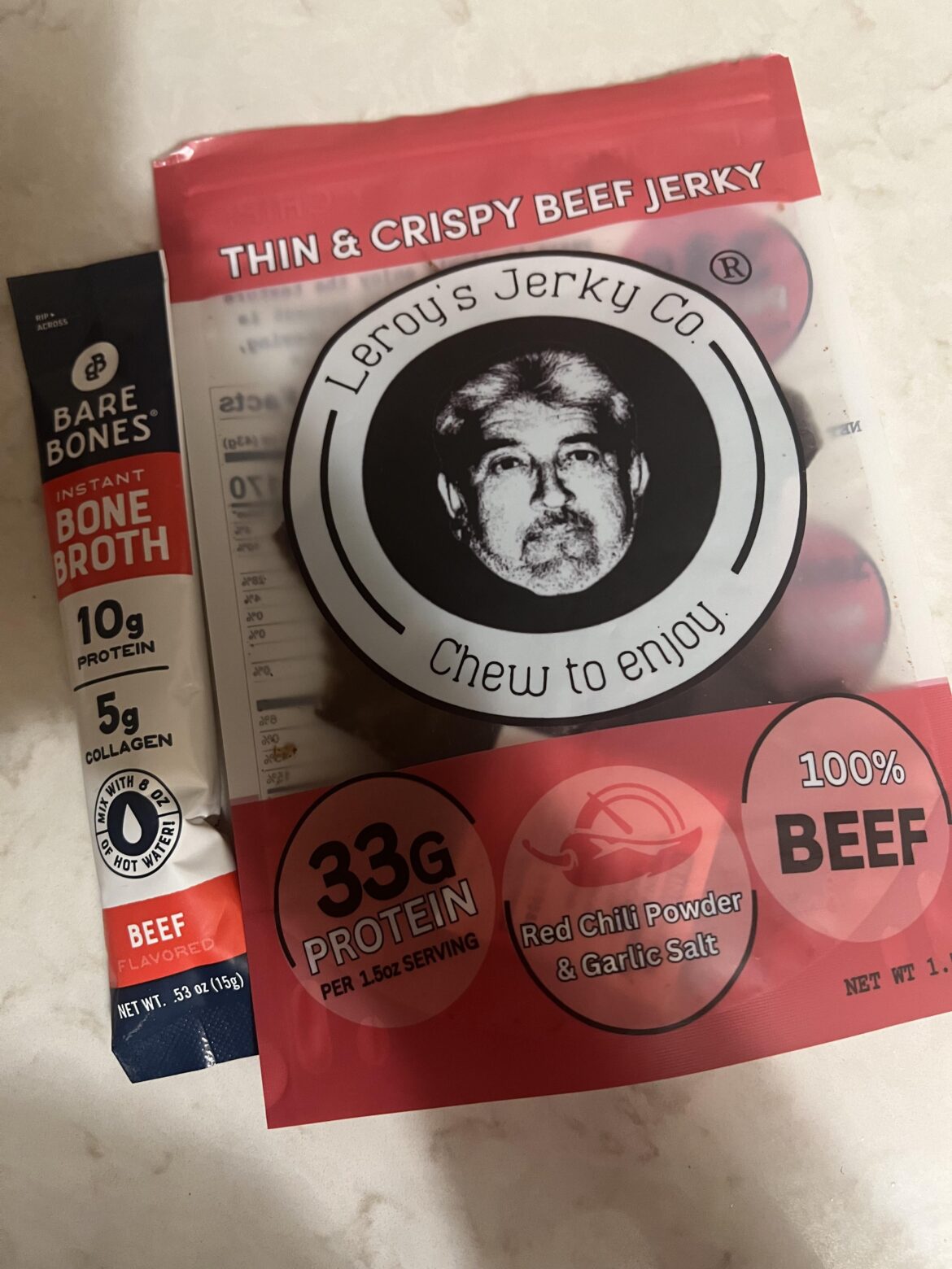 Post workout snack. 50 cal in bone broth and 170 in entire bag of beef jerky. 43g protein