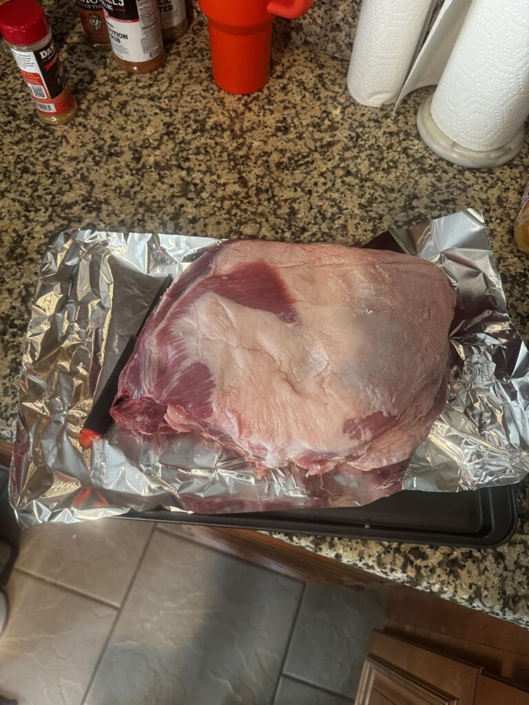 Pulled pork on the Traeger (and wings). Pork came out a little dry but still delicious.