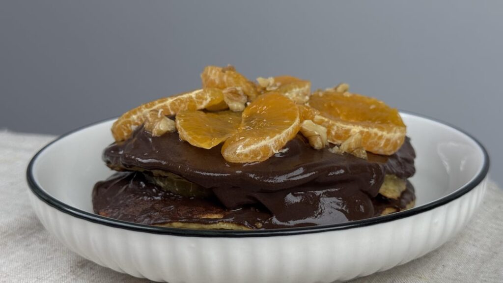 These chocolate pancakes blow my mind—just 300 kcal! Who’s on team pancakes? 🥞