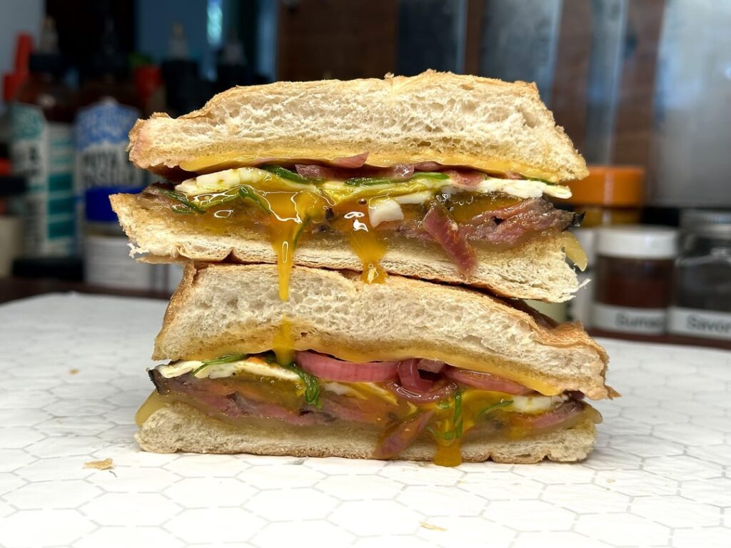 Steak, egg, and cheese breakfast sandwich