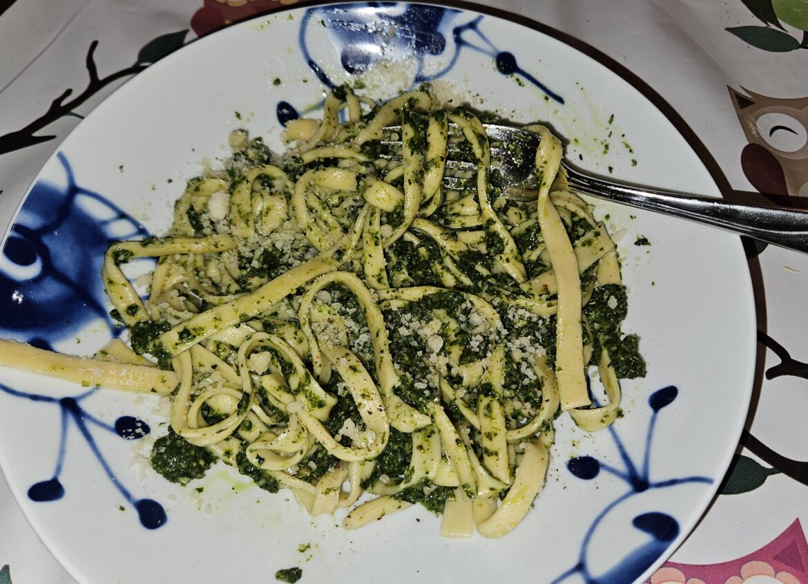 Homemade fettucine with spinach pesto. Youngest kid wanted this, and helped make it :-)