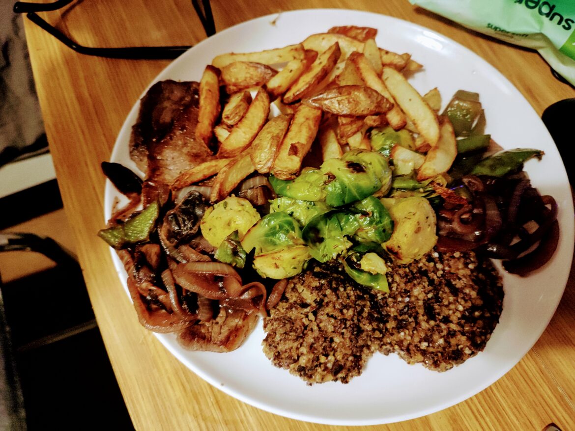Absolutely terrible picture but this is Steak, haggis, sprouts homemade chips w/ onion, mushroom and red wine sauce.