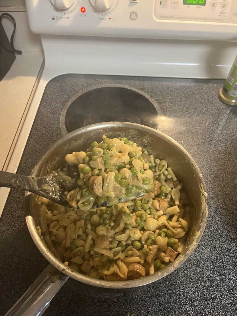 easy peas-y mac n cheese-y with caprese sausage step 2 cheese it and clean the pan with a lil more wine