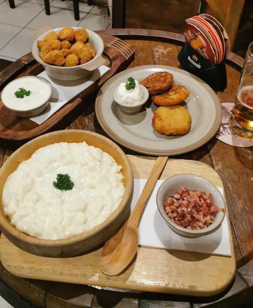 Some Slovak food :) Bryndzové Halušky (Sheep’s cheese potato pasta, similar to gnocchi, and fried bacon bits) Vyprážané šampiňóny (Breaded fried mushrooms) and Zemiakové Placky (fried potato pancakes)