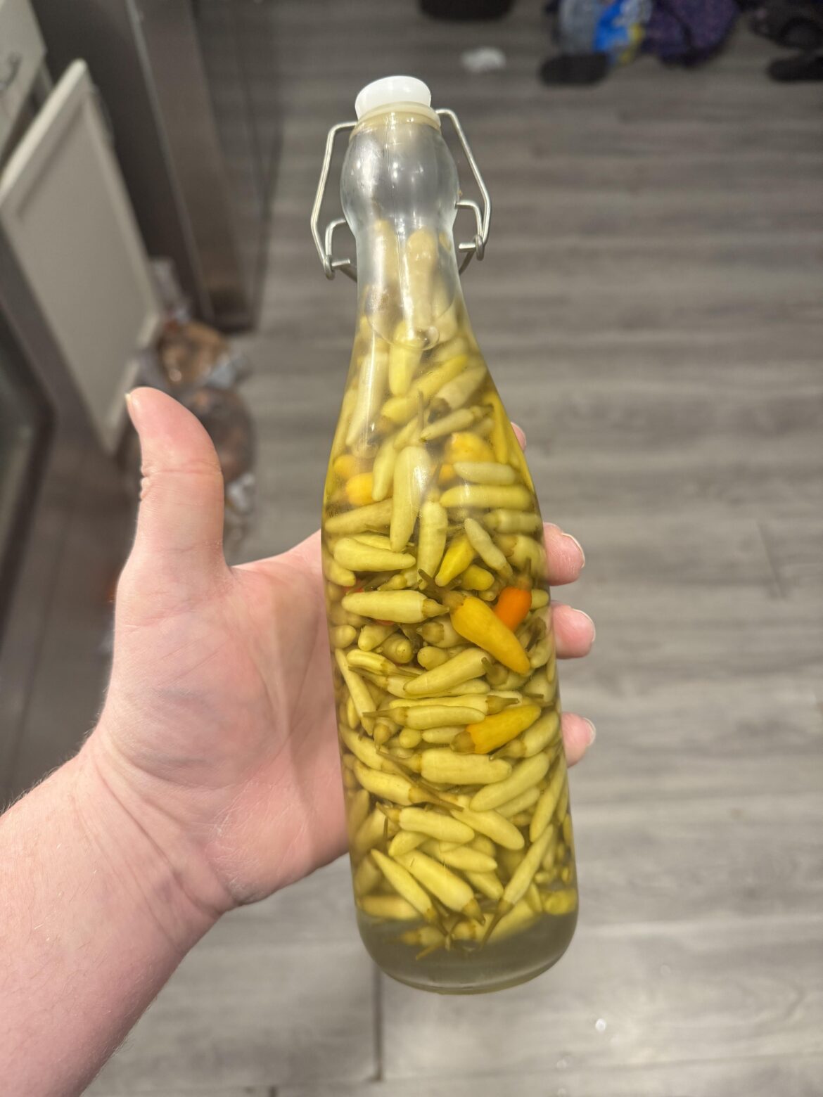 Pickled green Tabasco peppers.