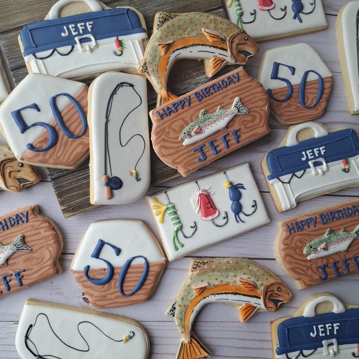 Fishing 50th birthday cookies! The fish are hand-painted.
