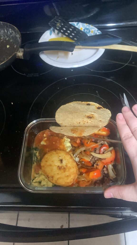 Breakfast bowl with two tortillas and a hash brown recommendation ~560 cal