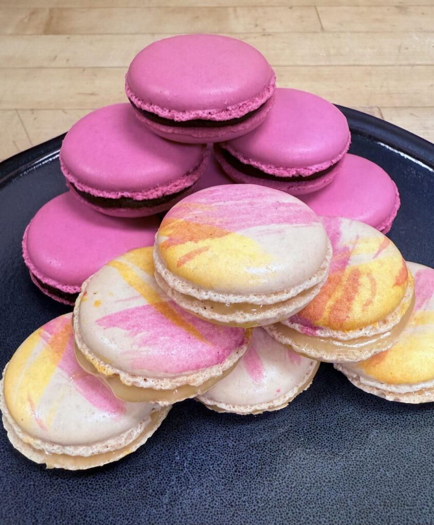 Vanilla passion fruit and strawberry chocolate macarons. Needed some bright colors on this cold day ☺️