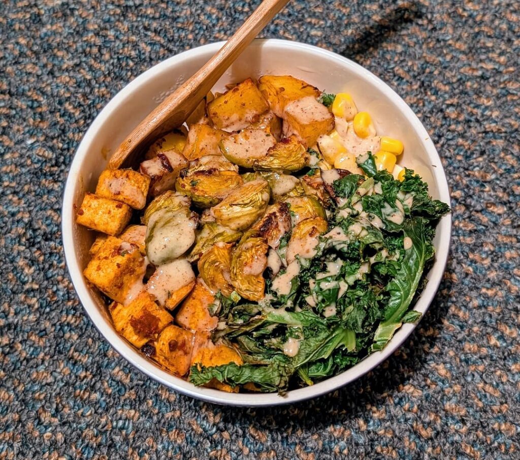 Roasted veg & tofu in harissa paste with tahini sauce