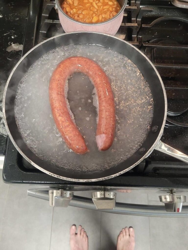Boiled sausage and beans
