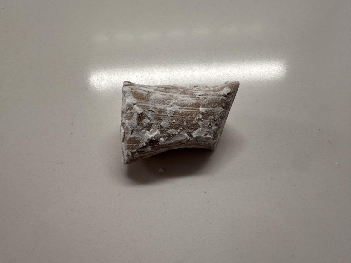 A piece of homemade yeot (Korean taffy). It’s hard, but softens in the mouth after a while. It also has a rather mildly sweet taste.