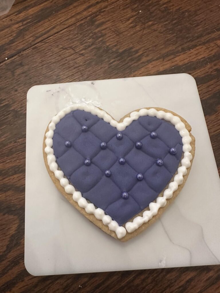 My most favorite Valentine’s Day designs this year (plus a bonus cookie I did for a HUGE 7 year old Chiefs fan I know)